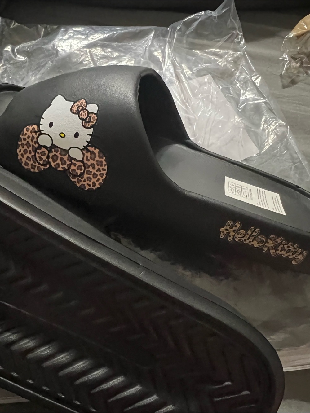 Hello Kitty Black Slide Sandals with Leopard Print Bow